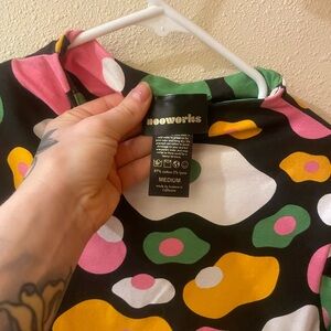 Nooworks size medium Demi mock neck dress in lovely psychedelic egg pattern.